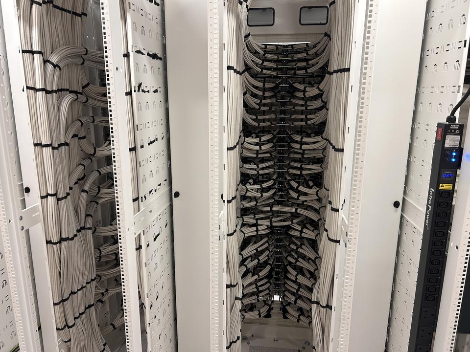 Close-up of neatly bundled patch cabling inside a rack